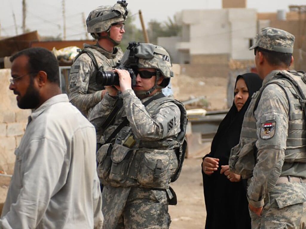 Emily takes photos during a mission in Baghdad, Iraq, during her deployment in 2010. Military, veteran, military transition stress