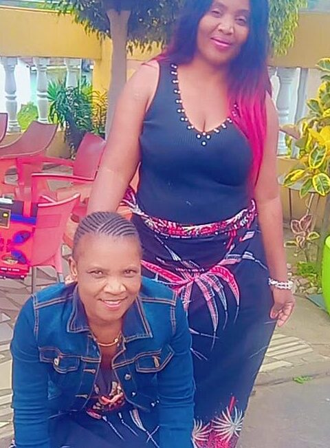 Maggie Chisoni poses with a friend while living in Durban, South Africa.