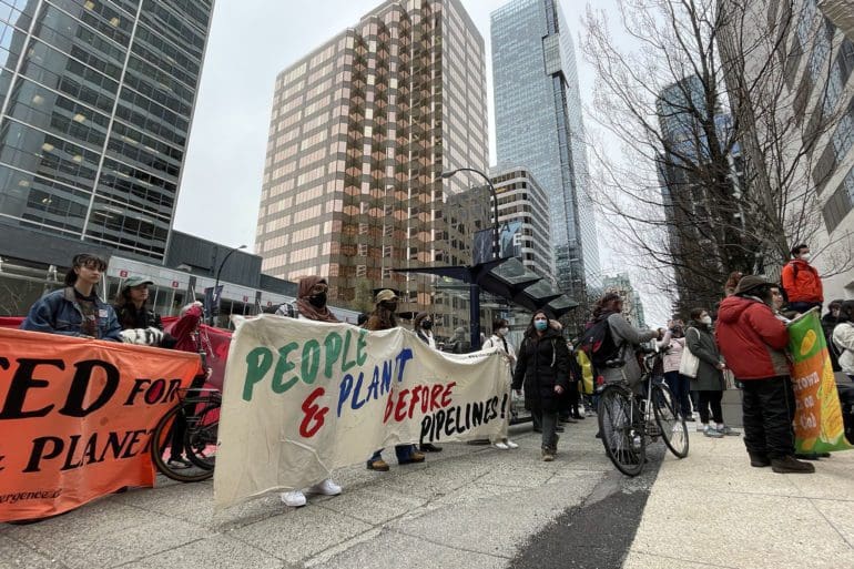 Protesters gather outside Vancouver City Hall