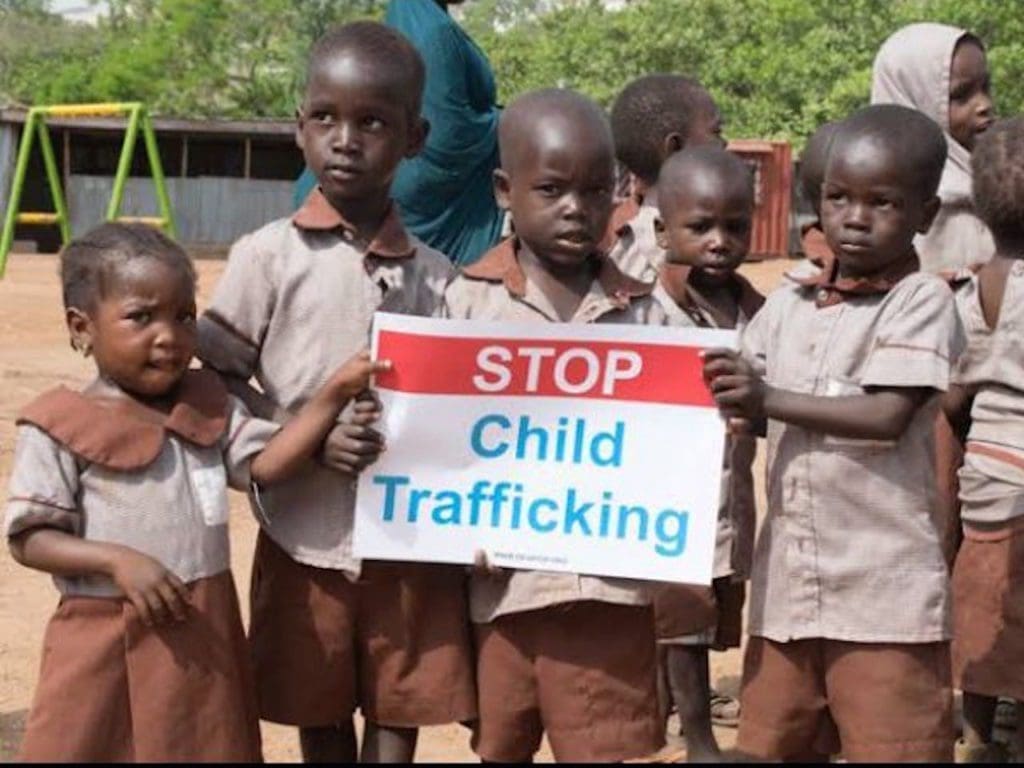 The photo is of young children who through civic education and fear of child trafficking, held peaceful demonstrations to call for immediate action on the criminal act of child trafficking.