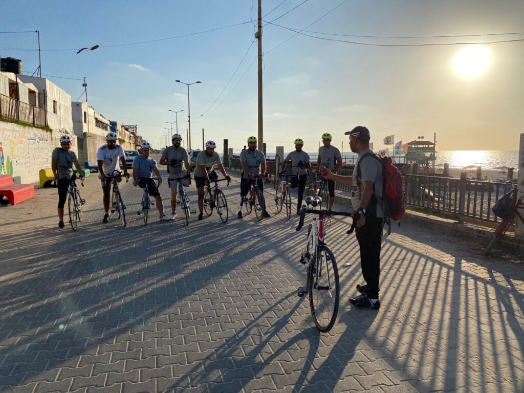 The war interrupted Hazem Suleiman and his team's training for the Paris Paralympics, leaving him to ride his bicycle through the wreckage of once-thriving streets. | Photo courtesy of 

