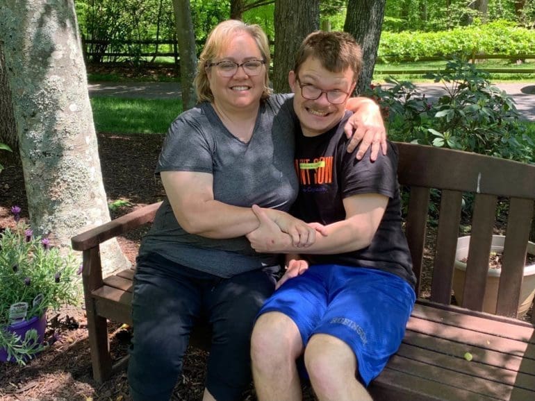 U.S. mother unknowingly adopts child with special needs, guides him toward independence