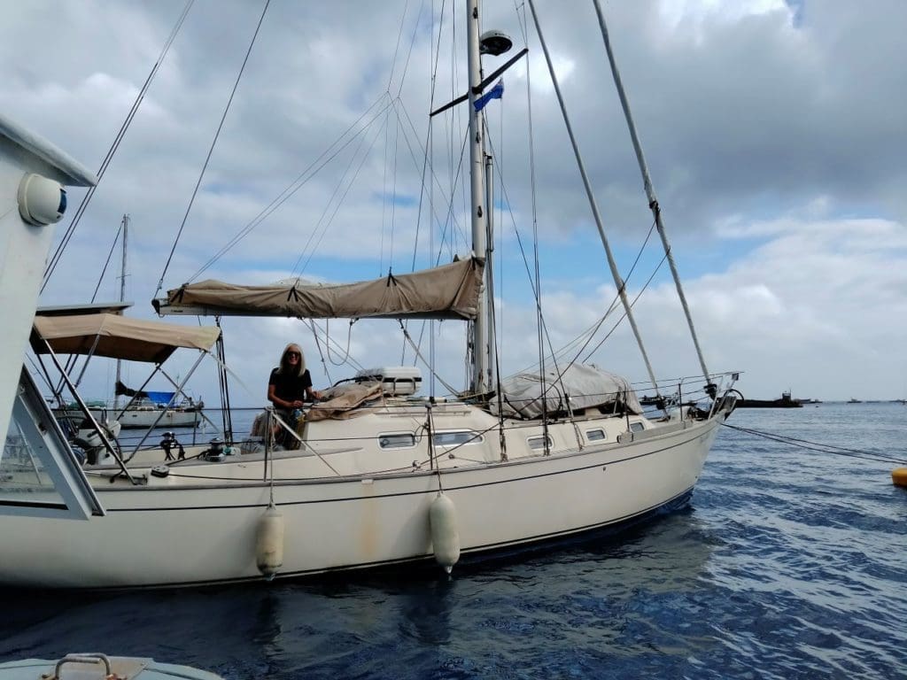 Kayo pictured on her boat the Nausikaa, which is a Vancouver 34, during her solo circumnavigation of the globe