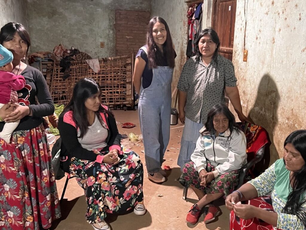Sandra (center, in overalls) grew up in an indigenous family and spent summers visiting her grandparents deep in the desert in the Wichi community. | Photo courtesy of Sandra Toribio