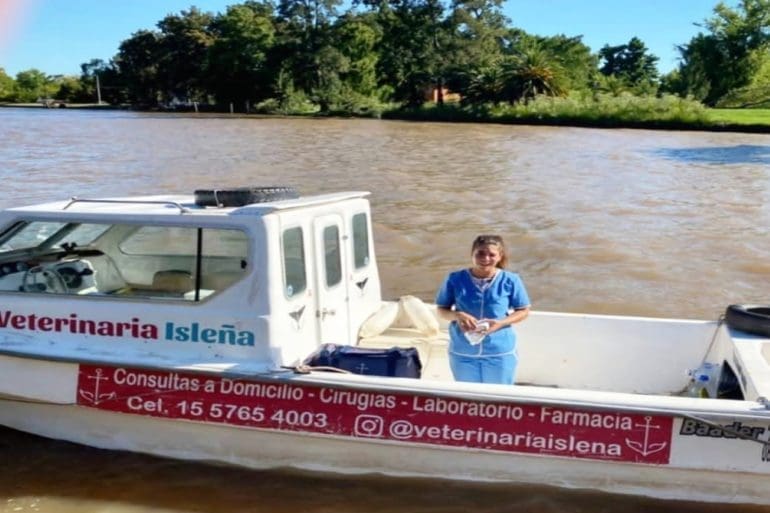 For veterinarian Leila Peluso López, a day at the office includes boating down the Paraná River to tend to patients.