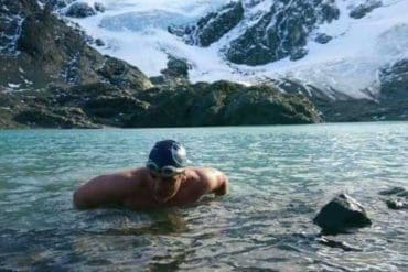 Walter Ruano swims in icy waters of one to three degrees Celsius without the protection of neoprene gear