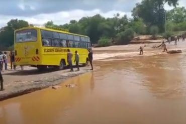 The bus full of people shown seconds before it tipped into the flooded Enziu River. So far, the death toll is at 33, including several children