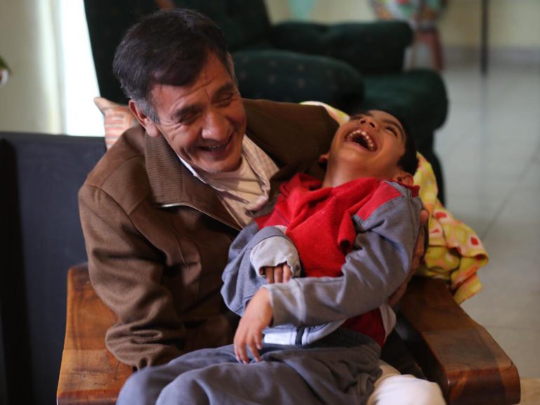 Grandfather becomes guardian of disabled grandson, writes book about their imaginary adventures
