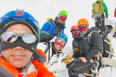 Kami Rita summits Mount Everest for a record 25th time with his team of Sherpas.