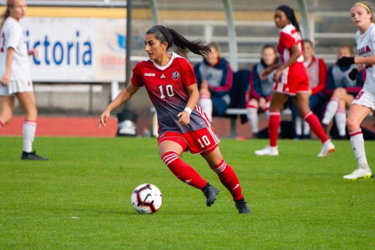 Farkhunda Muhtaj, 23, dribbles the ball for the York University Lions in Toronto, Canada. Muhtaj was instrumental in helping evacuate 26 Afghan Junior Women’s Team players and their families to safety in August.