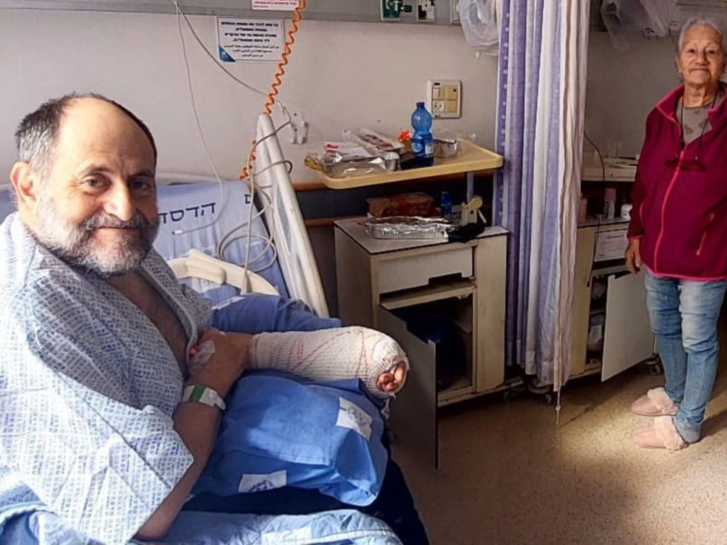 Moshe Rozen and his wife Diana in the hospital, recovering after surviving an attack near their home in the kibbutz | Photo courtesy Moshe Rozen