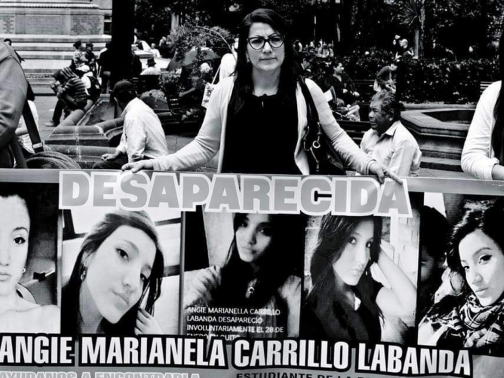 Yadira Labanda in Plaza Grande, Quito, a year prior to the 2016 discovery of her daughter's remains, holding a poster demanding justice for Angie Carrillo and other disappeared daughters | Photo courtesy Yadira Labanda
