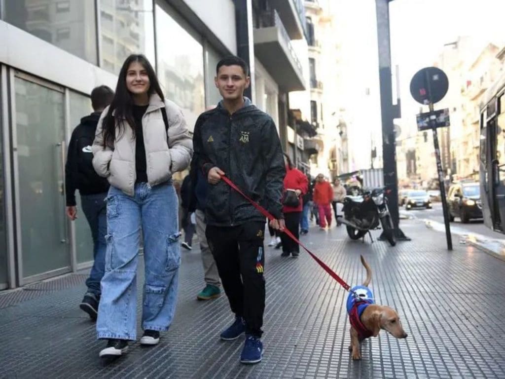 Emy (left) pictured with Facu (right) who she found living unhoused on the streets of the city. Emy helped Facu obtain housing through donations from a viral video she posted. Facus is now finishing school, living with his brother, and thinking about the future.