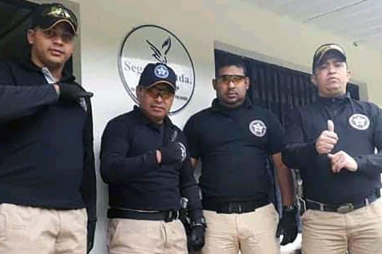 A photo shows Jean Carlo with a group of police officers before he was killed.