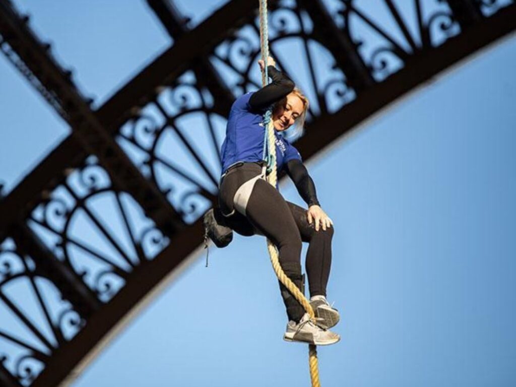 Anouk Garnier of France set a new world record by climbing 110 meters of the Eiffel Tower on a rope in Paris. | Photo courtesy of Anouk Garnier's Team