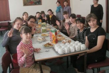 Orphans in Kazakhstan gather for snacks
