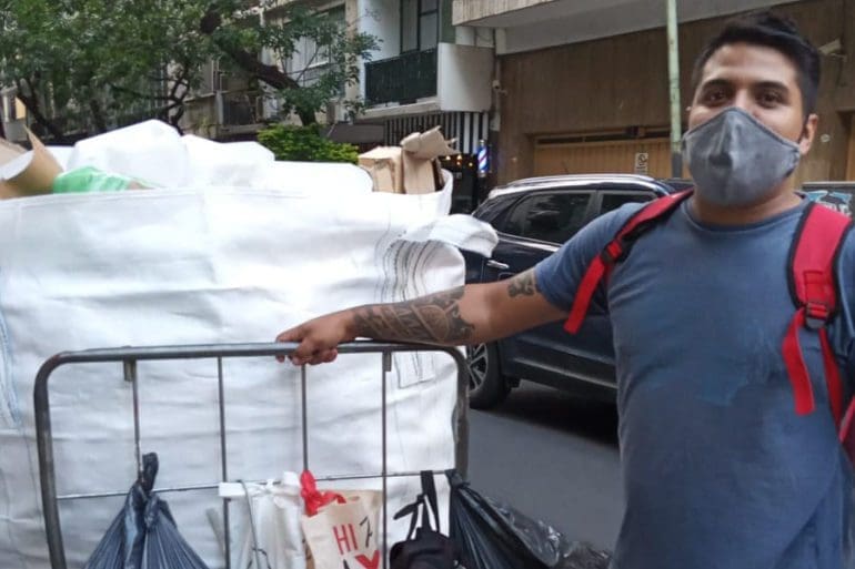 Alejandro Sabater, 29, travels the streets of Buenos Aires to collect recyclables and put himself through college