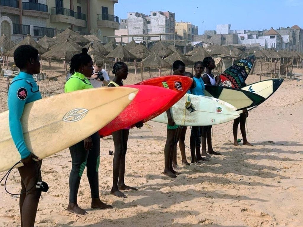 A photo showing surfers from the program participating in a training camp in Senegal.